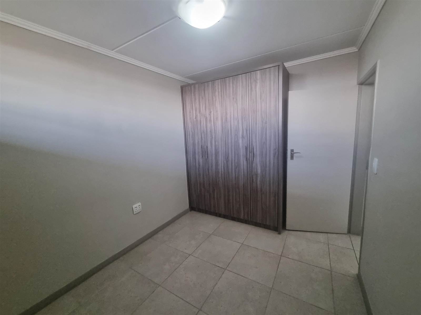 2 Bed Apartment in Rooihuiskraal North photo number 15